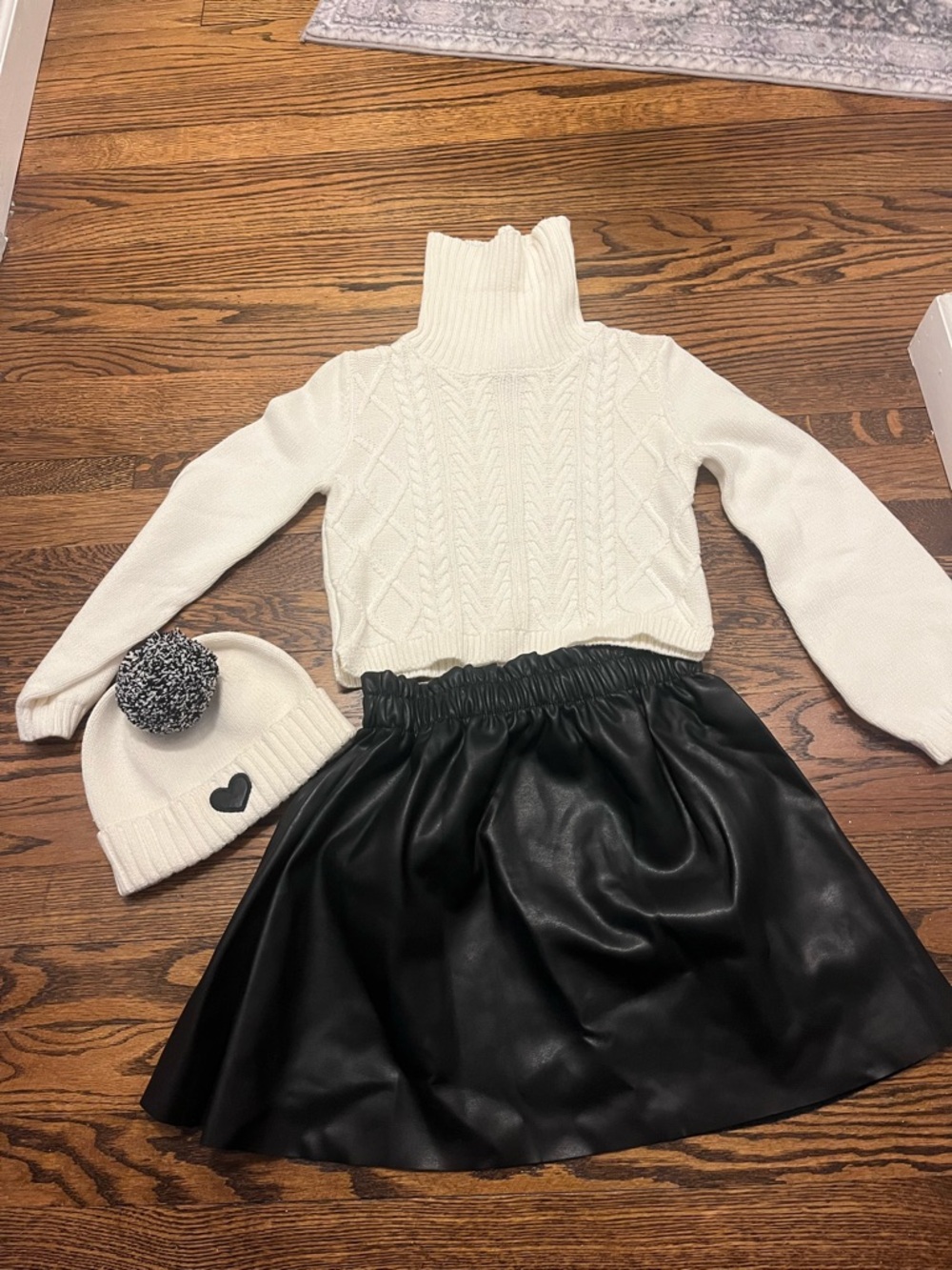 Cream Cable Knit Turtleneck Sweater with Black Faux Leather Skirt
